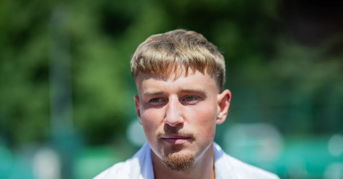 Ed Butvilas, hearing compliments from Serbs, expressed mixed feelings: "Both good and not good"