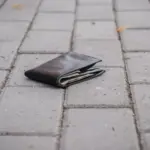 Officers are investigating who the wallet found by the woman belongs to