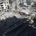 20 people died in a gas explosion in a collapsed building, including five children