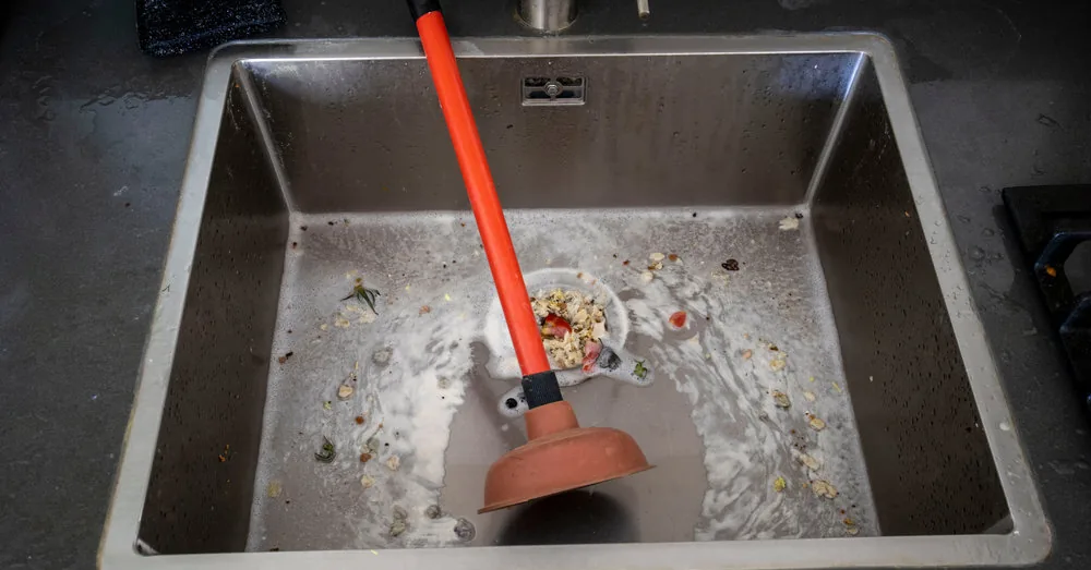 Your one kitchen cabinet ingredient will instantly unclog the sink