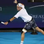 Cramp-stricken French tennis player served with his weak hand
