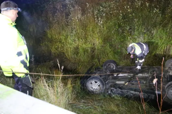 In Kaunas district, a "VW Golf" overturned after colliding with another car, and a woman fell out of it